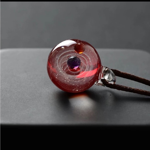 Choose red or blue planet unisex pendant on cording - Picture 1 of 4